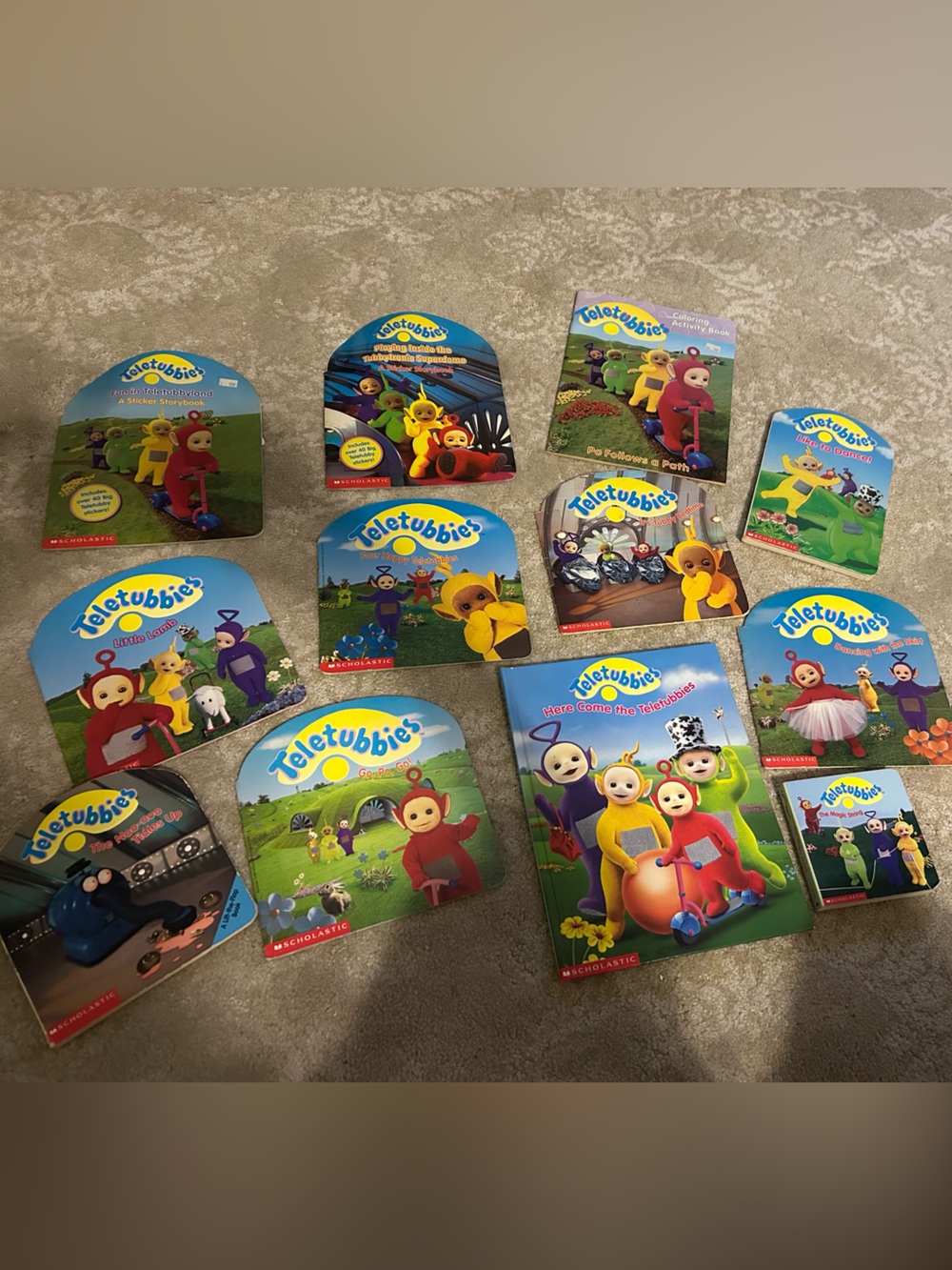 13 Teletubbies books.  Hard to find collection! Vintage PBS show!  Kids. Funny!